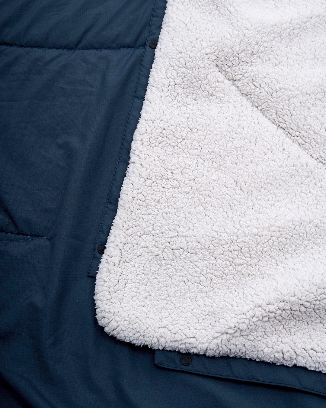 A close up of a Saltrock Yogi - Camping Blanket - Blue.