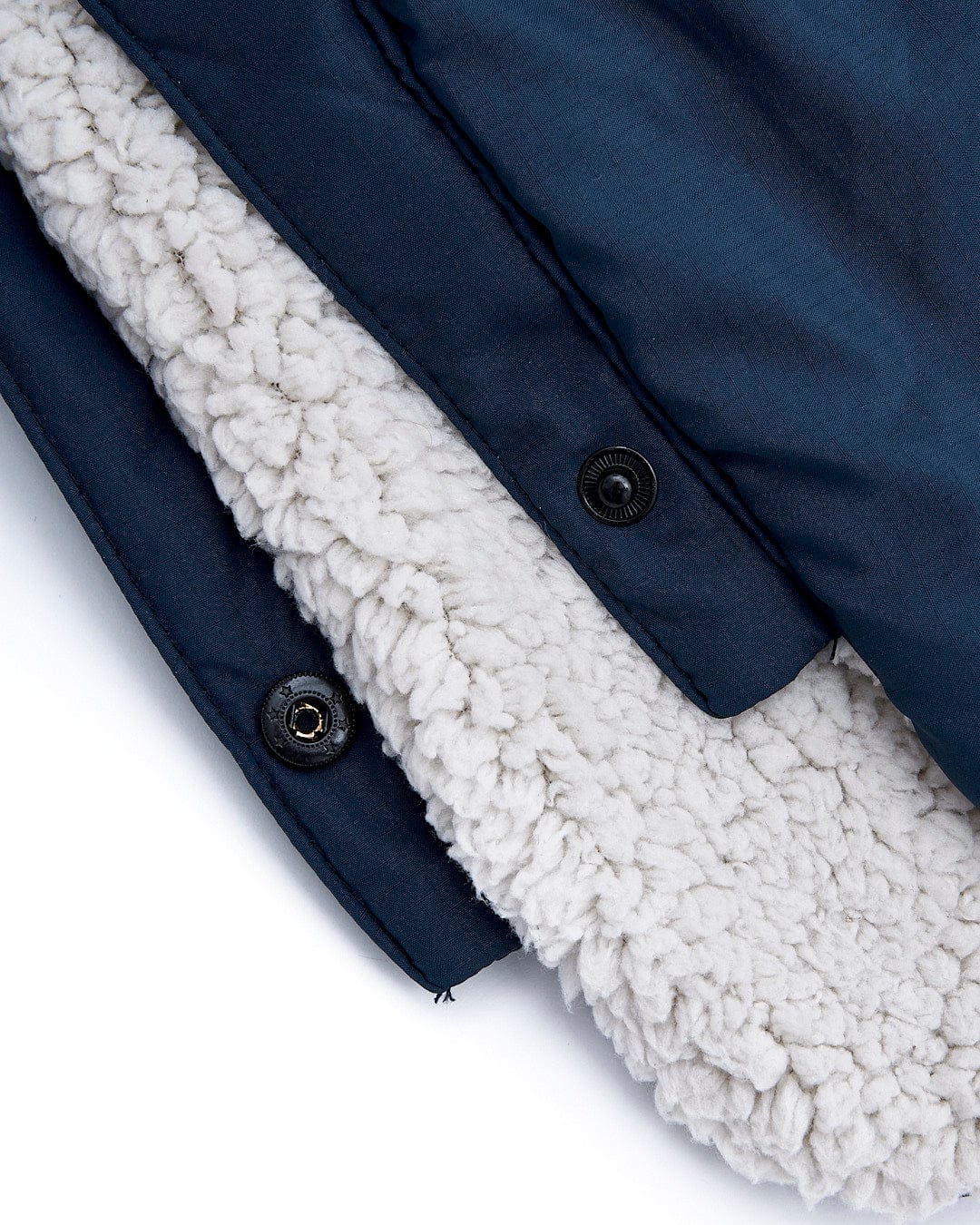 A close up of a blue Saltrock sherpa jacket.