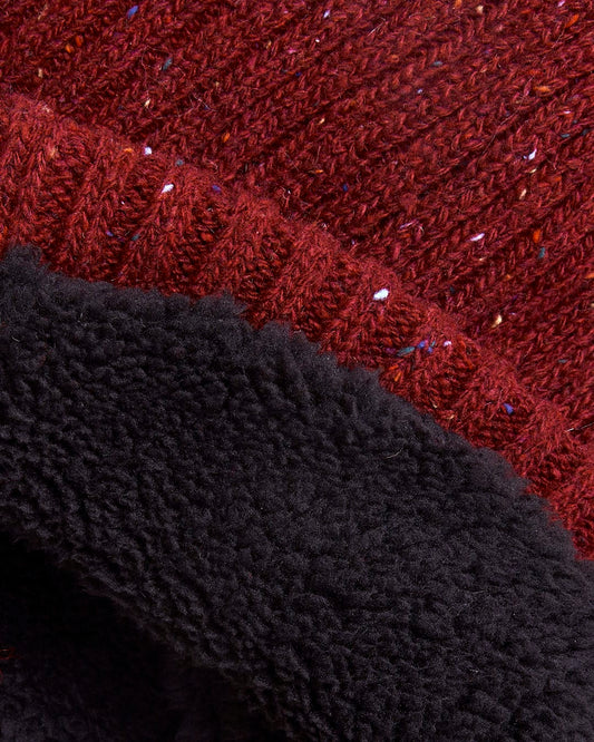 A close up image of a Saltrock Heritage - Beanie - Red.