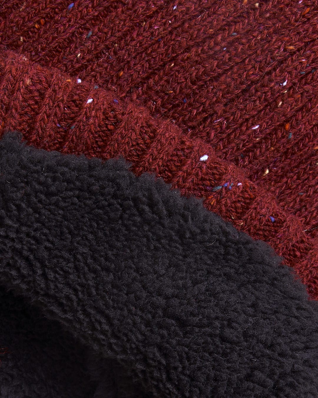 A close up image of a Saltrock Heritage - Beanie - Red.