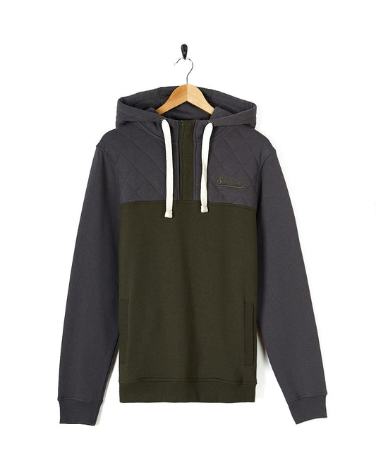The Saltrock Aiken Mens 1/4 Neck Hoodie offers warmth and comfort in an olive green and black design, perfect for the outdoors.