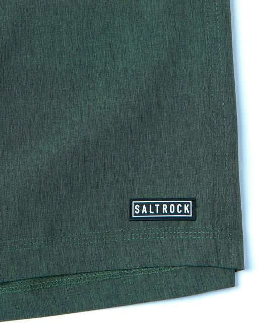 A Dark Green Amphibian 2 shirt with the word Saltrock, made of a Hybrid 4 way stretch material.