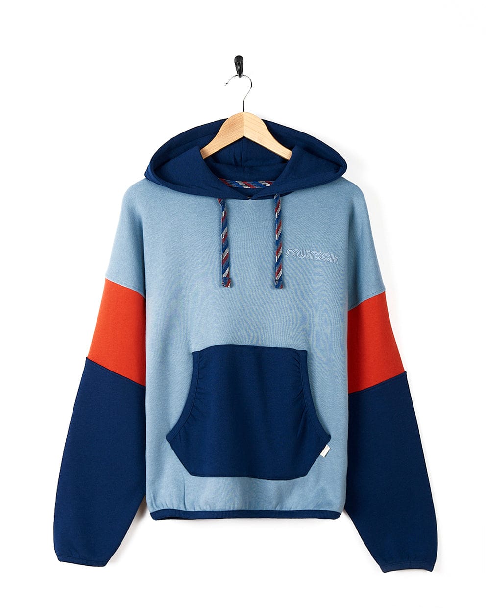 A relaxed fit blue and orange Saltrock hoodie with contrast paneling, featuring Saltrock branding, hanging on a hanger.