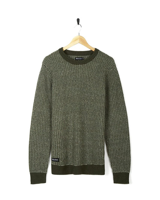 An Arlen - Mens Crew Knit - Dark Green sweater hanging on a hanger. (Brand Name: Saltrock)