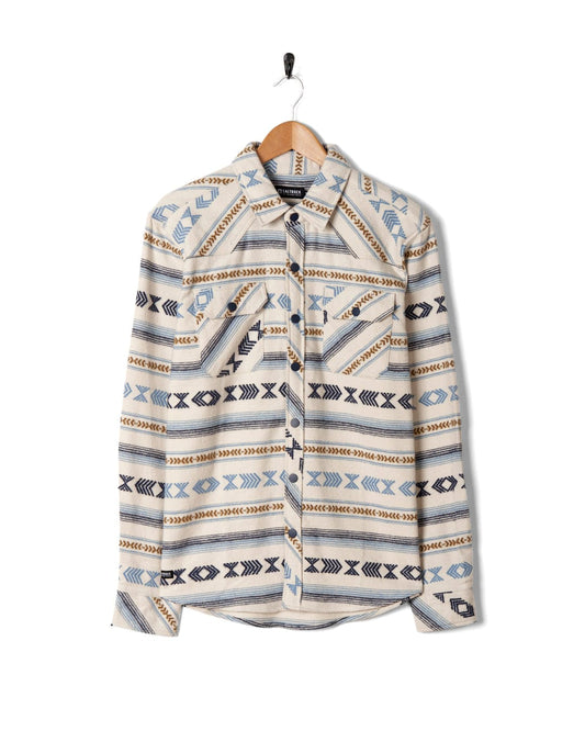 The Asher - Mens Jacquard Shirt - Cream by Saltrock is hanging on a hanger, featuring cuffed sleeves.