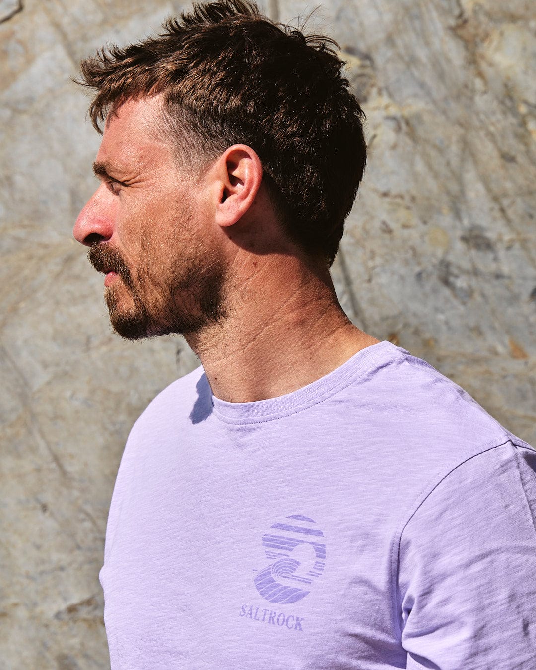 A man wearing the Saltrock Atlantic - Mens Short Sleeve T-Shirt - Purple.