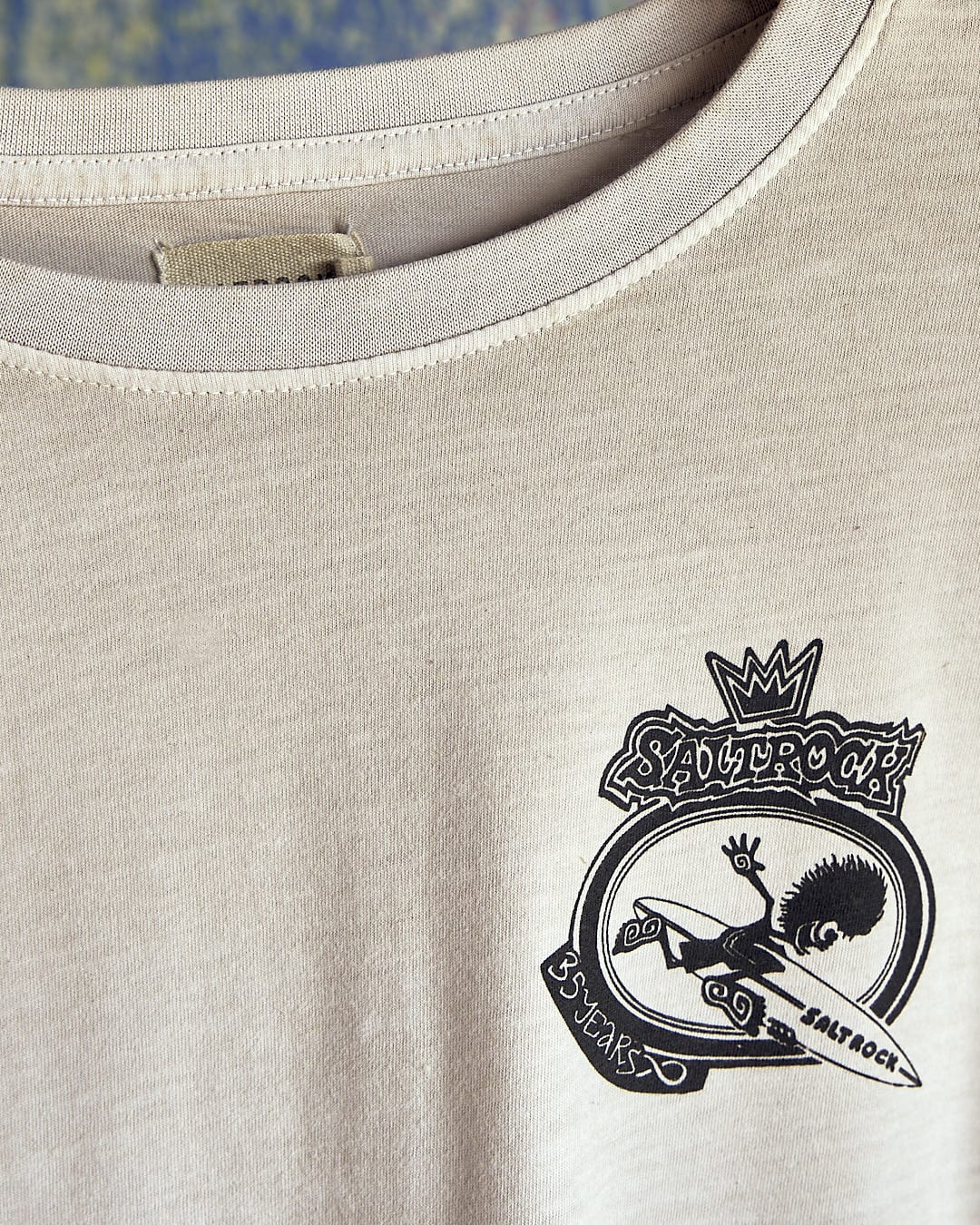 A Balls To The Wall - Limited Edition 35 Years T-Shirt with a crown on it, made by Saltrock.