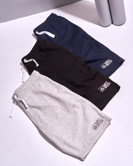 Three pairs of versatile Saltrock Original 20 - Mens Sweat Shorts - Grey on a white surface, perfect for everyday adventures.