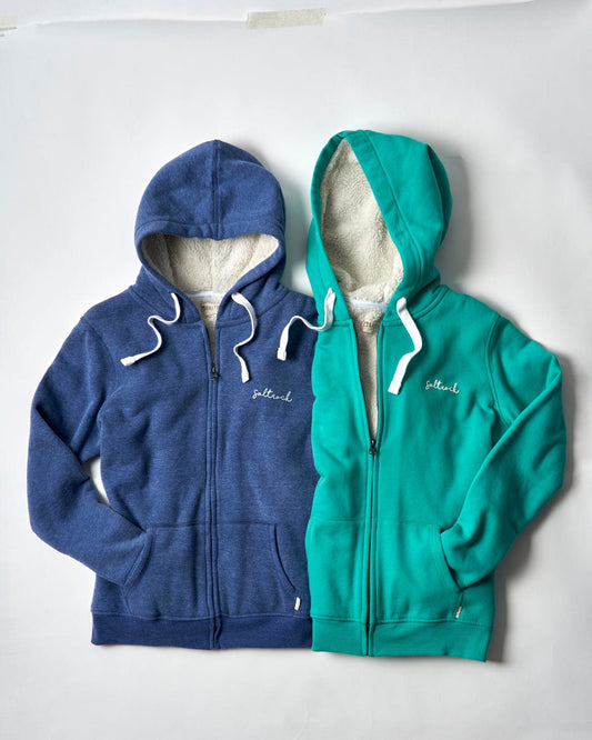 Two blue and green Saltrock branded Velator - Womens Fur Lined Hoodies - Navy on a white surface.