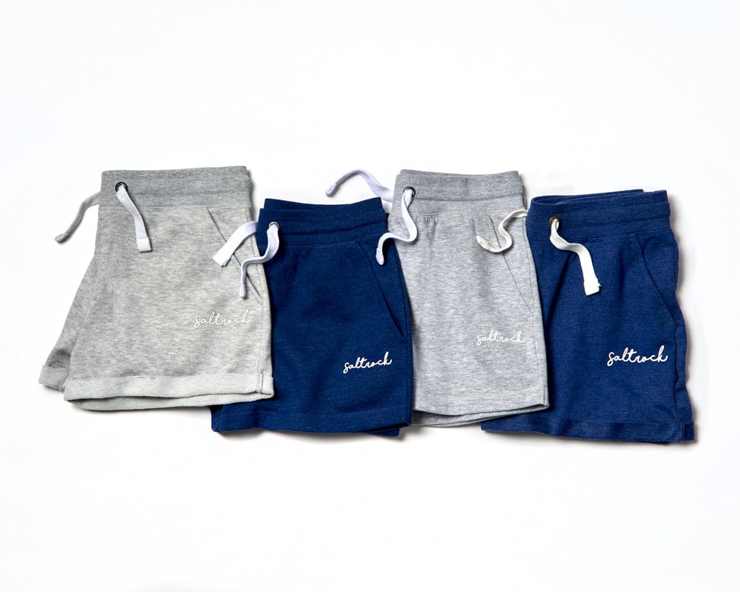 Four pairs of Velator - Womens Sweat Shorts - Light Grey with the word phloem on them, featuring Saltrock branding.