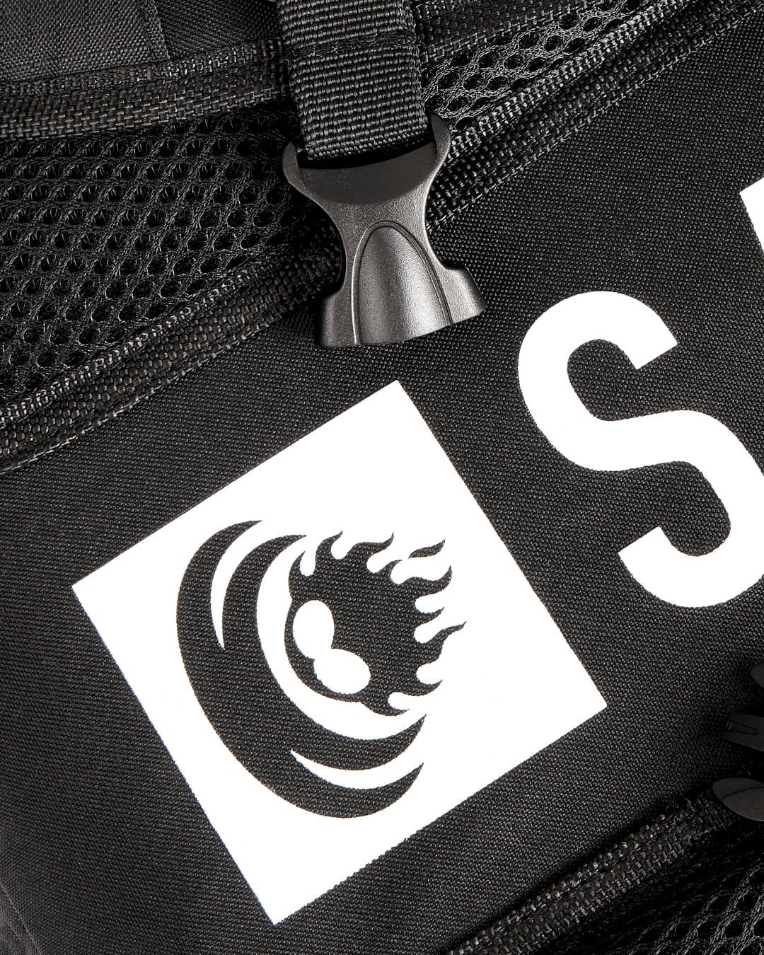 A close up of a Saltrock - Boardwalk Backpack - Black bag with a logo on it.