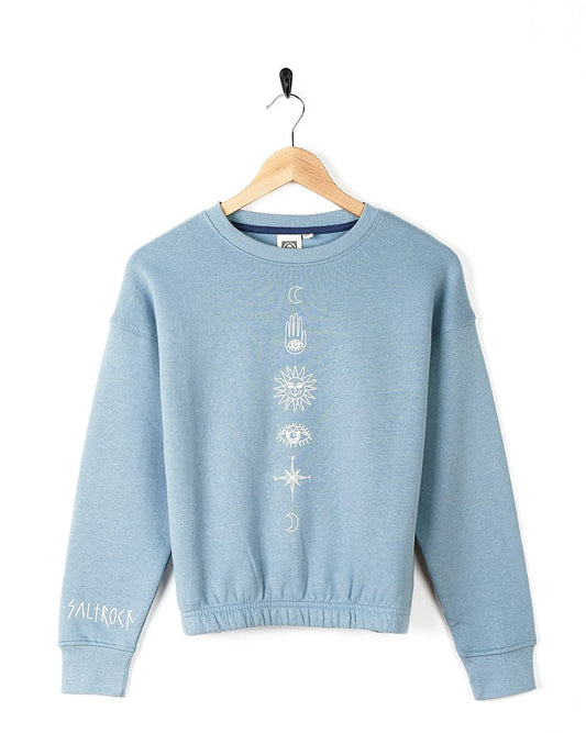 A light blue Saltrock Bodhi - Kids Crew Sweat sweatshirt with symbolic graphics on it.