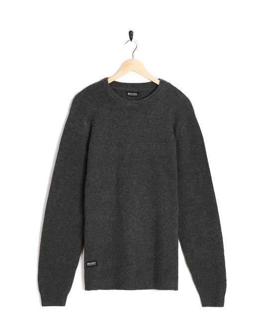 A Saltrock Bowen - Mens Knitted Crew - Dark Grey sweater hanging on a hanger.