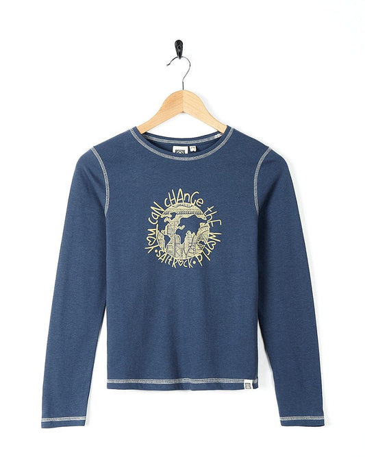 A blue long-sleeved Change The World - Kids Long Sleeve T-Shirt - Blue with a gold Saltrock branding.