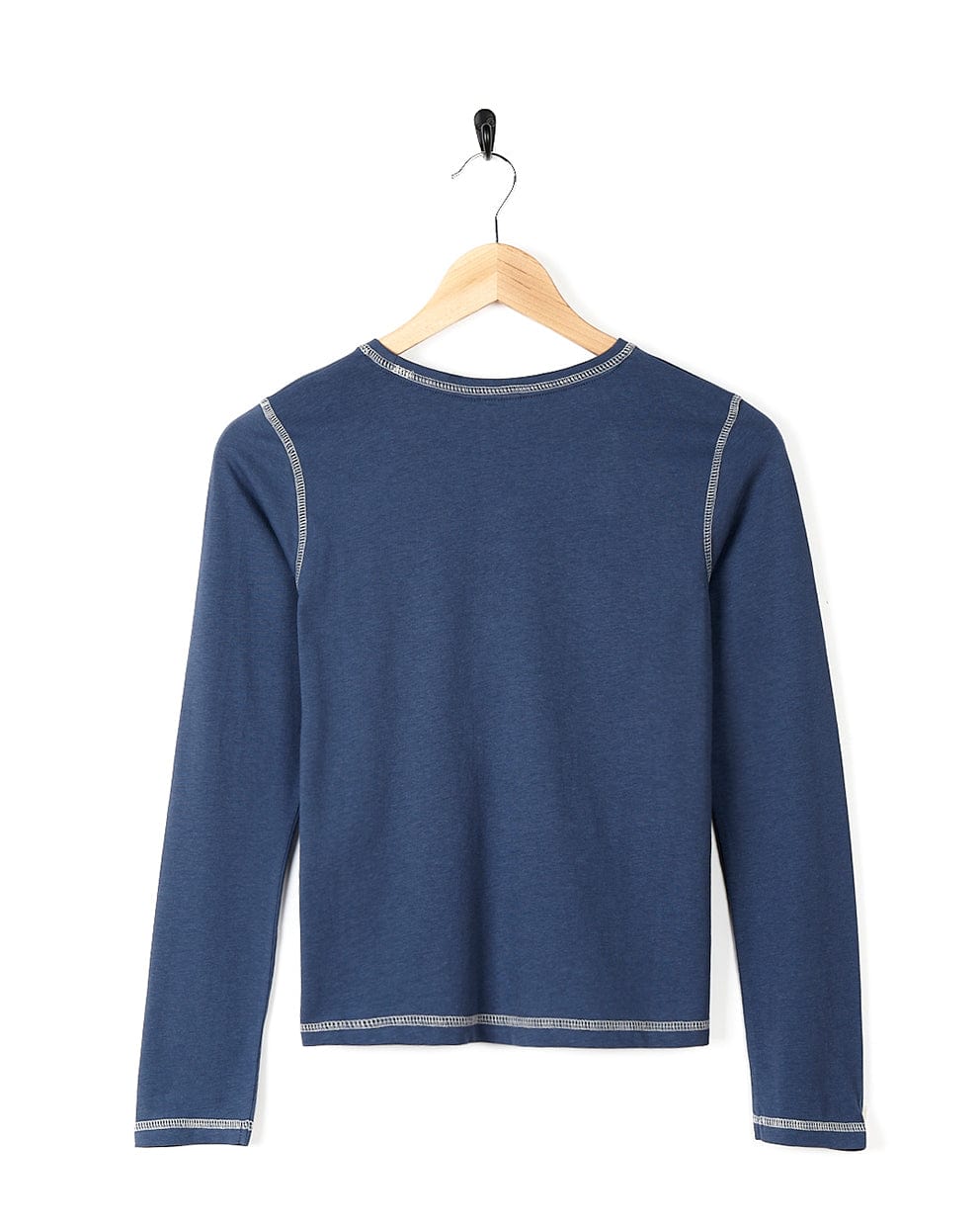A blue long-sleeved shirt with Saltrock branding hanging on a wooden hanger has been replaced with Change The World - Kids Long Sleeve T-Shirt - Blue by Saltrock.