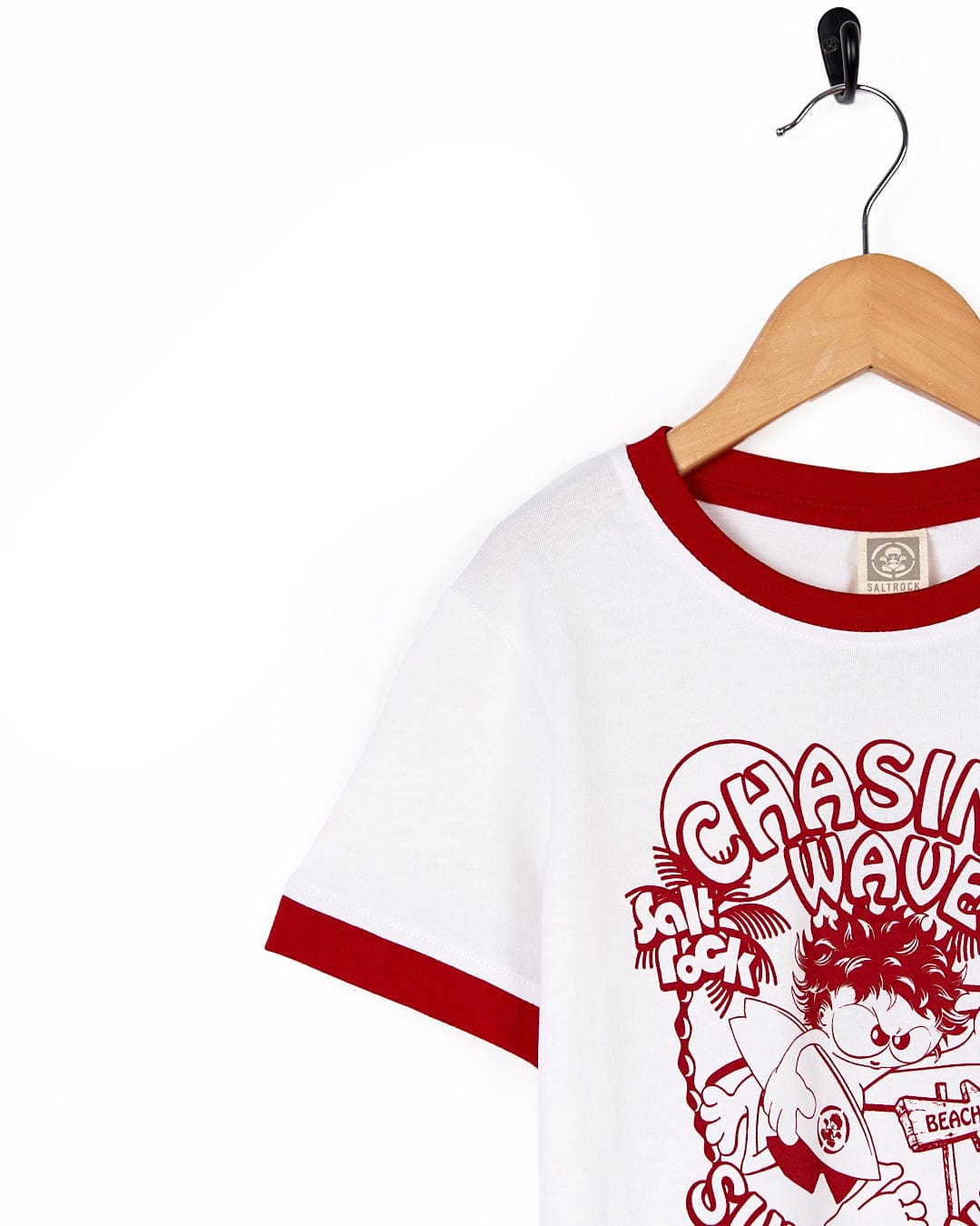 A Saltrock Chasing Waves Kids Short Sleeve T-Shirt that says chasing waves.