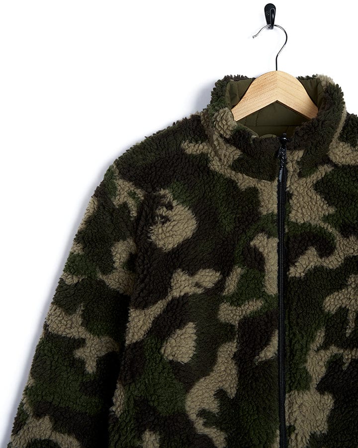A Saltrock Cirrus - Quilted Reversible Jacket - Dark Green in camouflage.