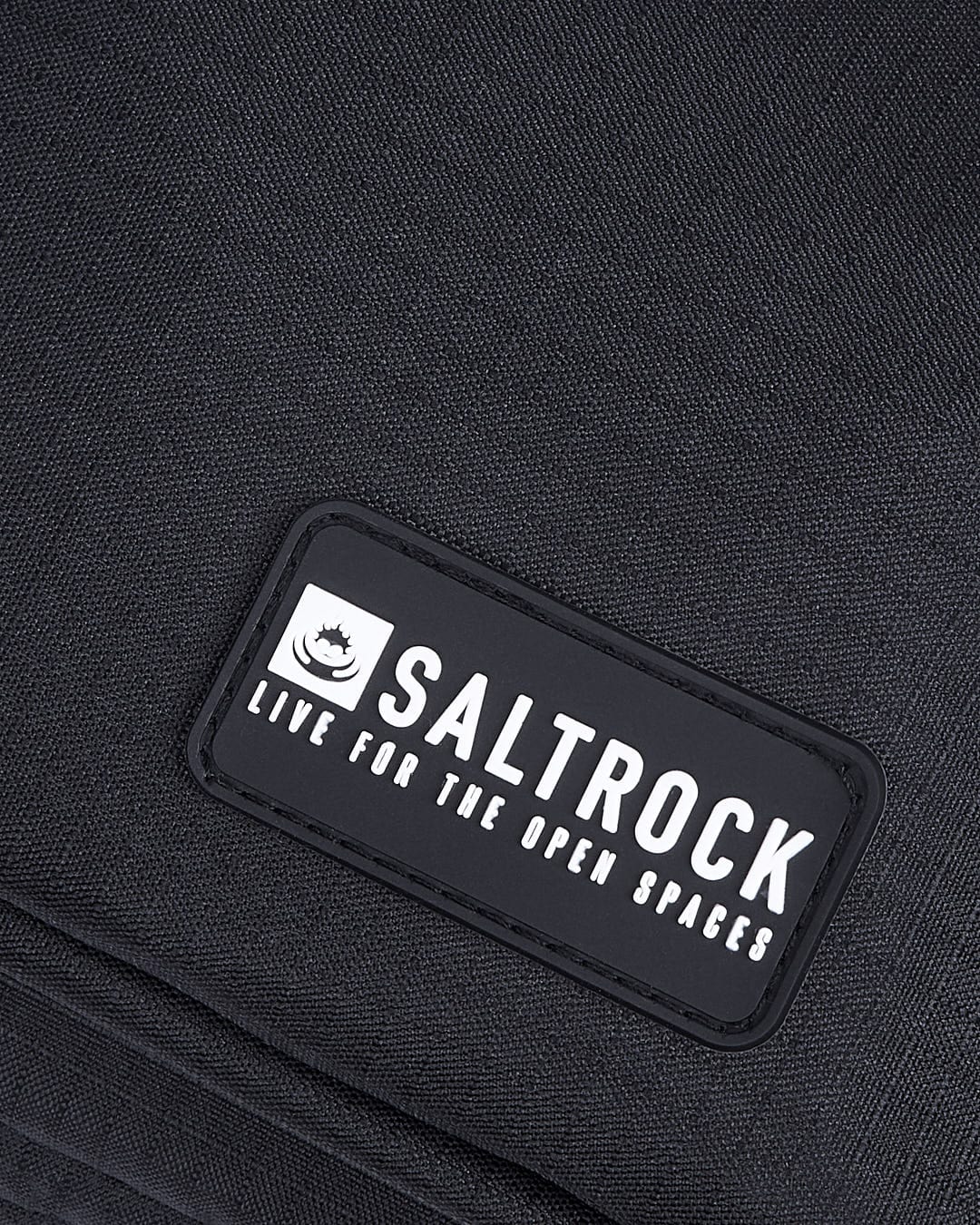 A Coda - Cross-Body Bag - Black with the Saltrock logo on it.