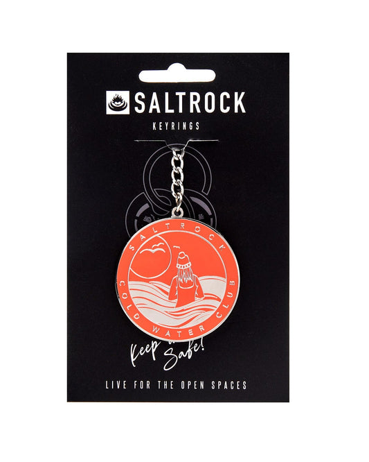 Keyring with a sunset and wave design by Saltrock, attached to a black display card with a safety clasp.
