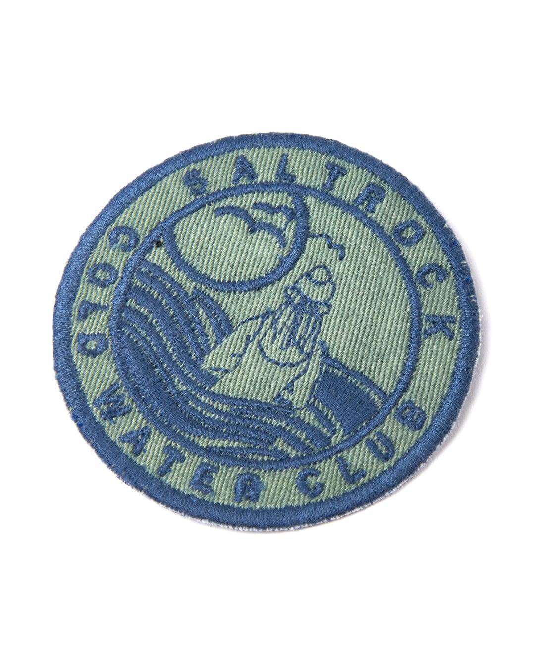 An embroidered green patch with the words "Cold Water Club" on it by Saltrock.