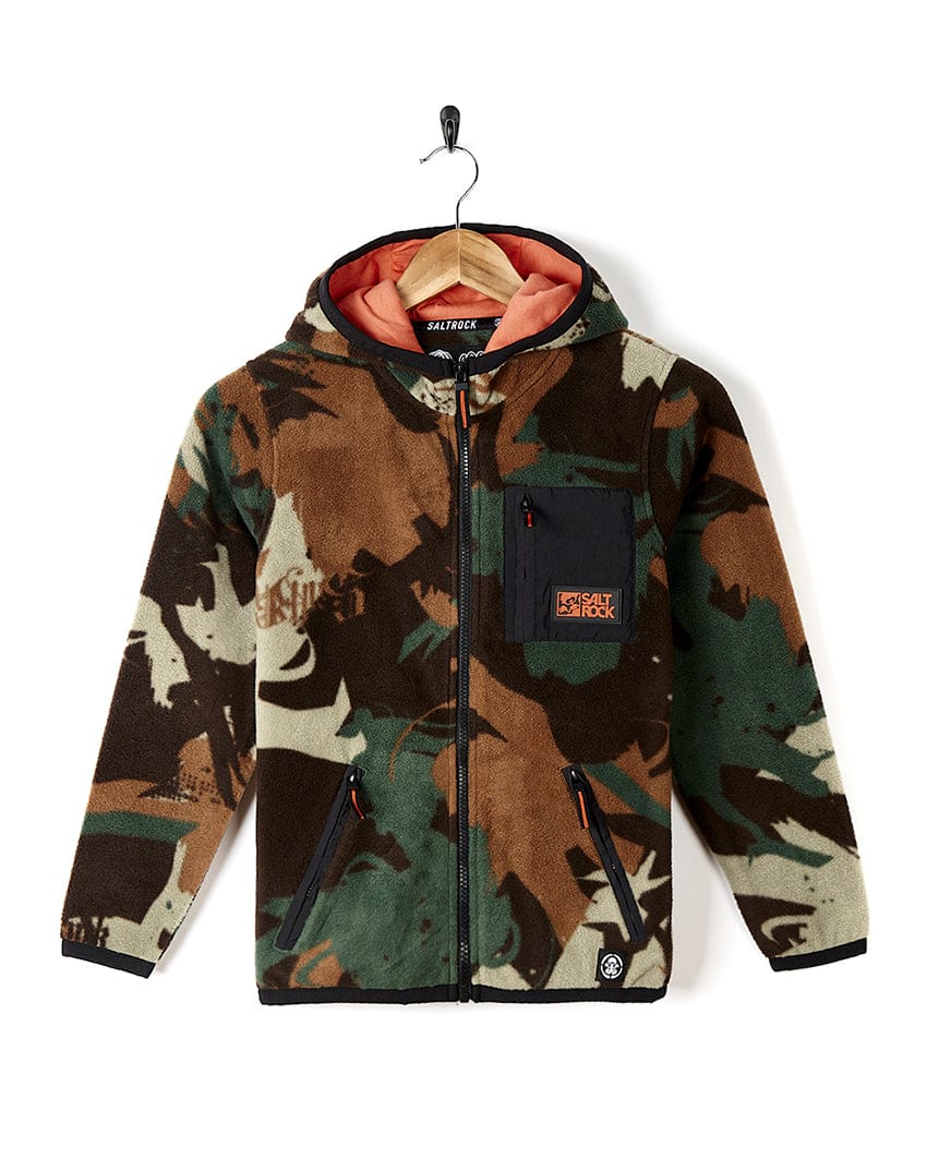 A Saltrock Communicado - Kids Camo Zip Fleece - Dark Green hooded jacket hanging on a hanger.