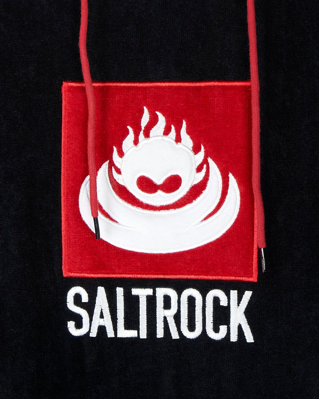 Red and white Saltrock logo on a Corp Changing Towel - Black.