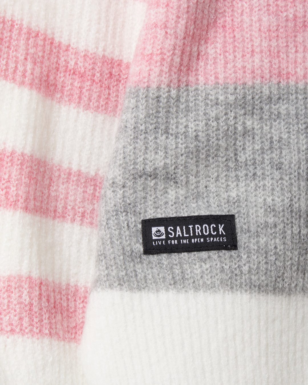 A close up of a Darcy - Womens Knitwear - White sweater with soft touch fabric from Saltrock.
