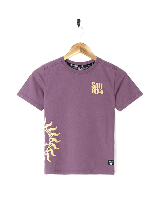 A Dawnrise - Kids Short Sleeve T-Shirt - Purple with a golden sun on it. (Brand: Saltrock)