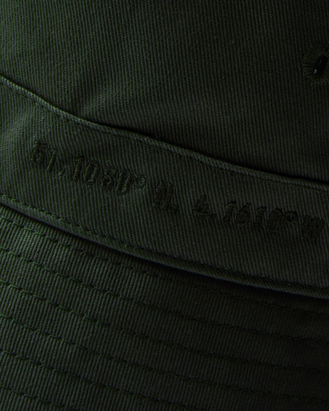 Close-up of Saltrock Dockyard - Bucket Hat - Green with embossed lettering.