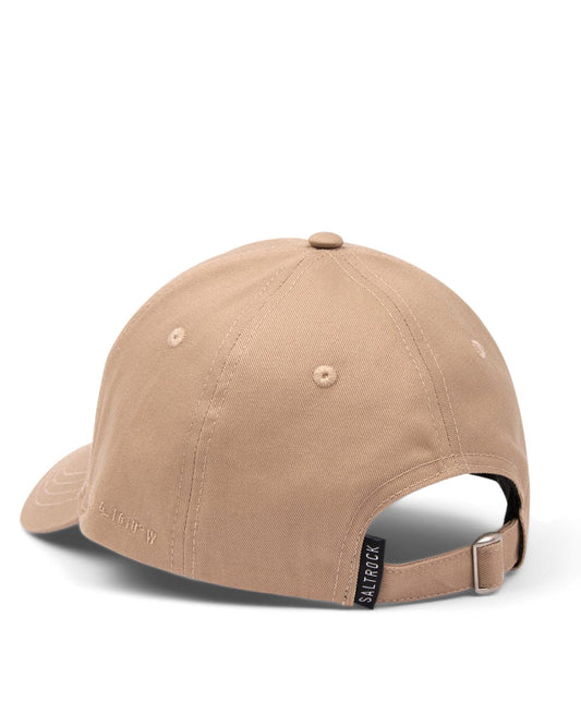 A beige Dockyard cap with a Saltrock badge and an adjustable back on a white background.