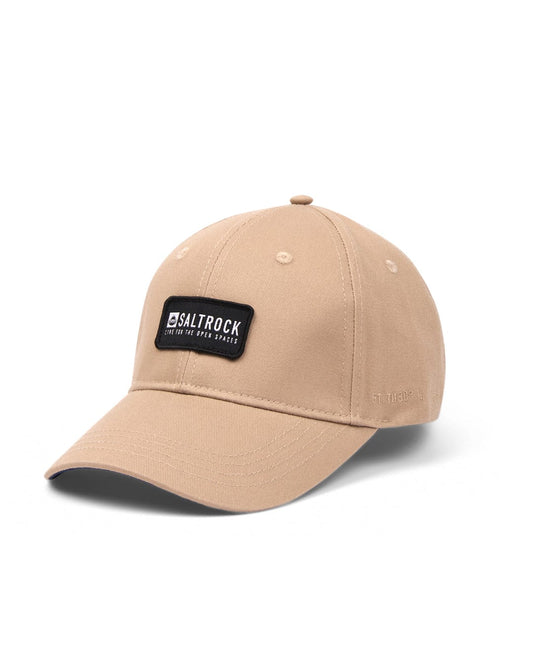 Cream Dockyard baseball cap with a Saltrock badge patch on the front and an adjustable back.