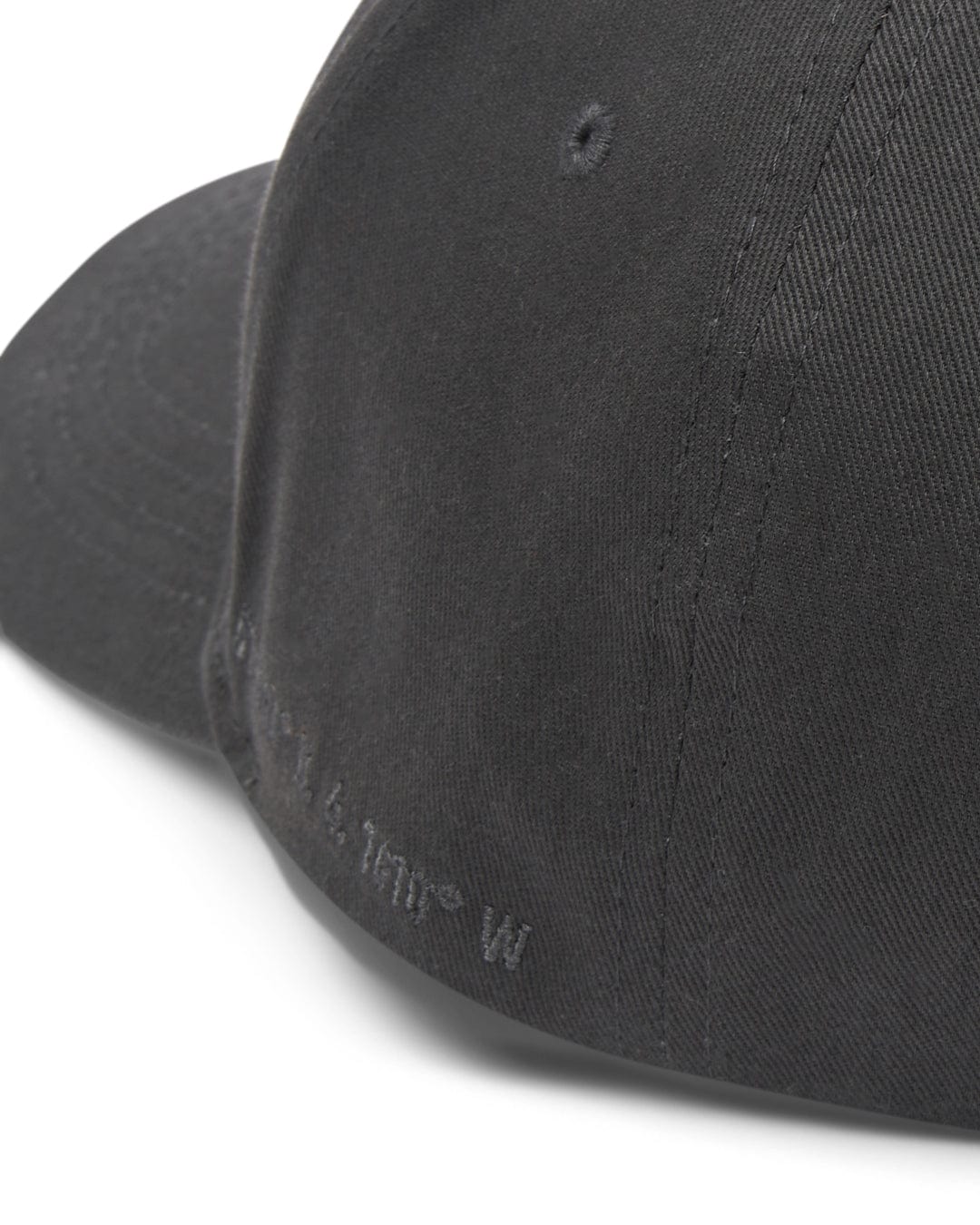 Close-up of a Saltrock Dockyard Cap in Dark Grey showing texture and stitch detail.