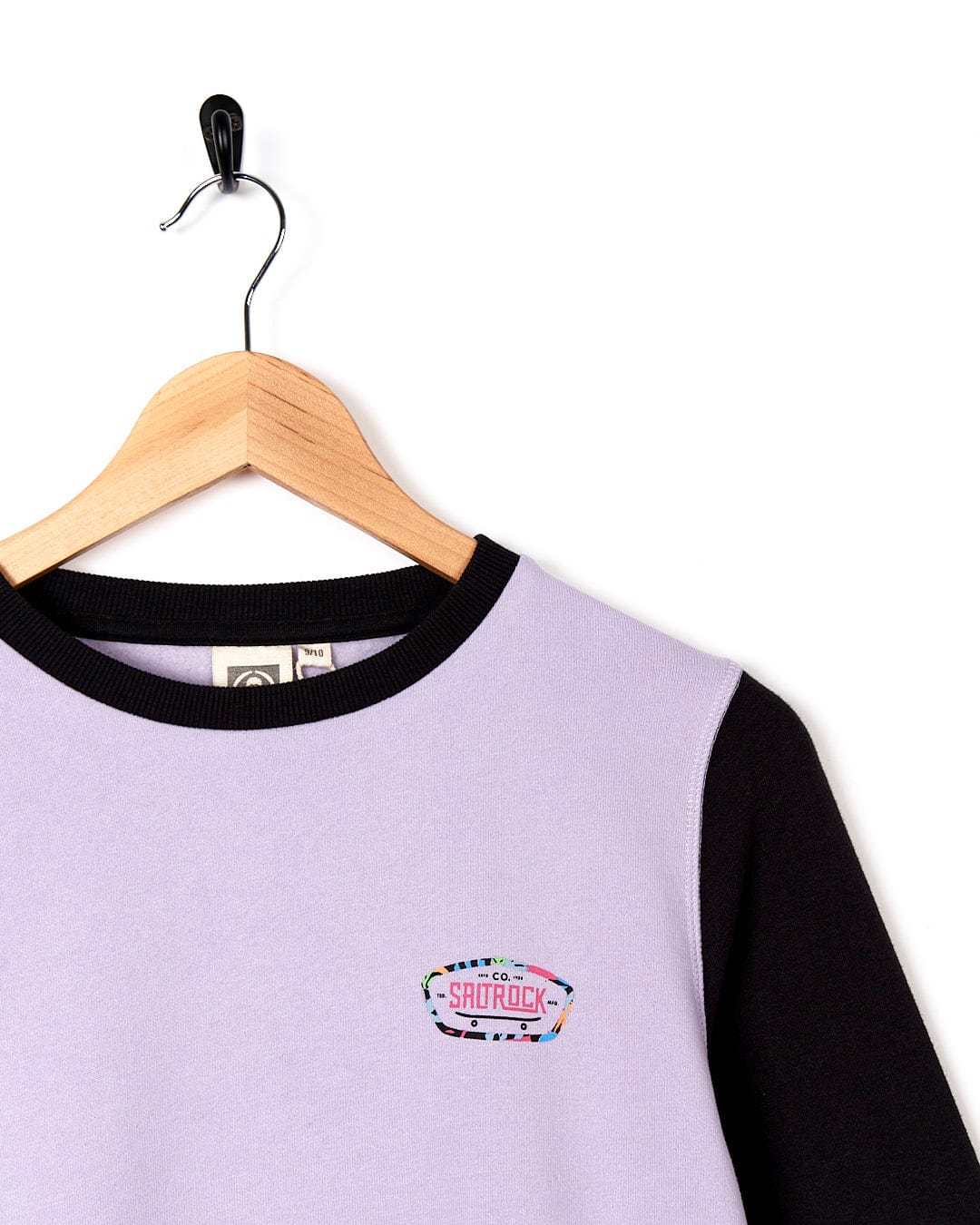 A Elissa - Kids Crew Sweat - Light Purple sweatshirt with a black and white Saltrock logo on it.
