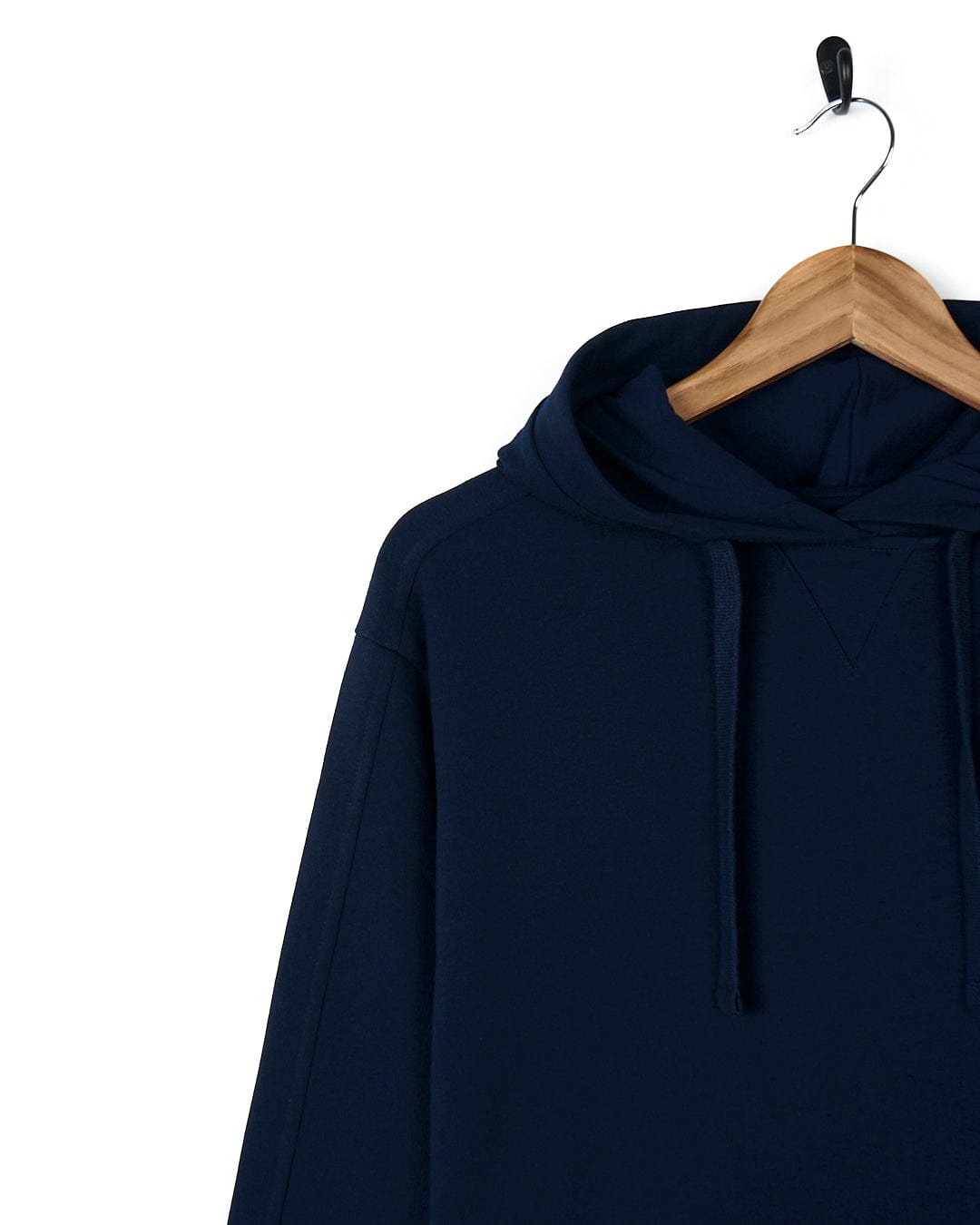 A stylish Saltrock Elsa - Womens Hooded Sweat Dress - Dark Blue hanging on a hanger, offering both comfort and style.
