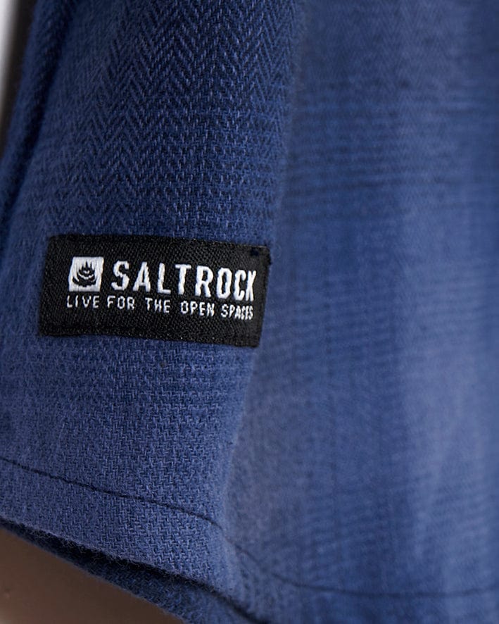 A Farris - Mens Check Shirt - Blue with the Saltrock branding logo on it.