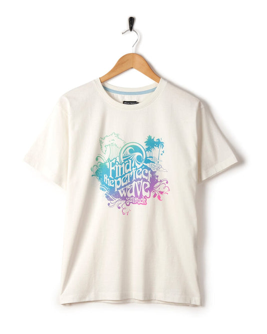 White Find The Perfect Wave - Womens Short Sleeve T-Shirt featuring a multi-colored slogan with beach-themed graphics, hanging on a hanger against a plain background by Saltrock.