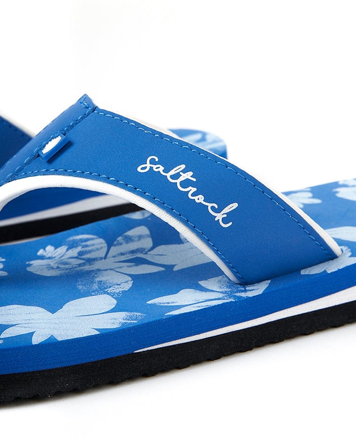 A pair of Floral - Womens Flip Flops - Blue by Saltrock.