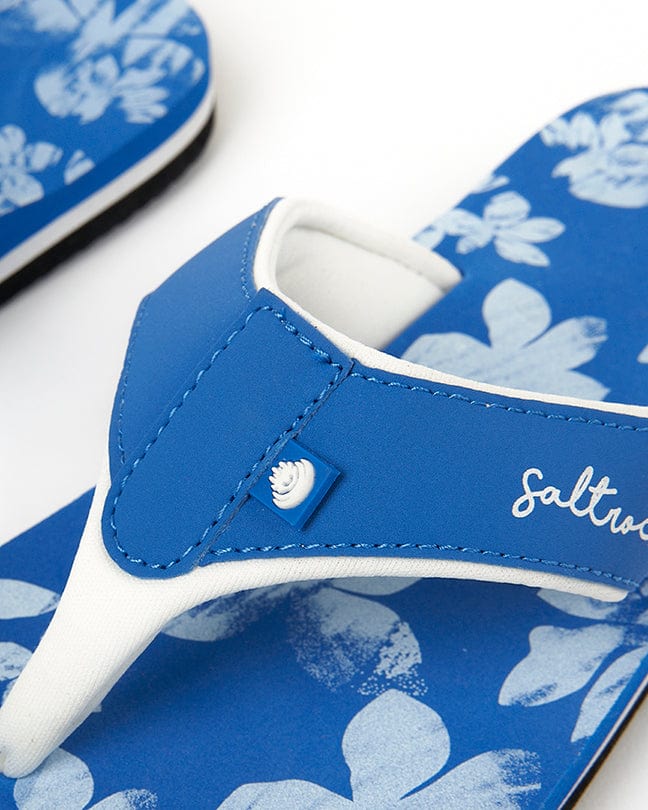 A pair of blue Saltrock Floral - Womens Flip Flops - Blue sandals with a floral design.