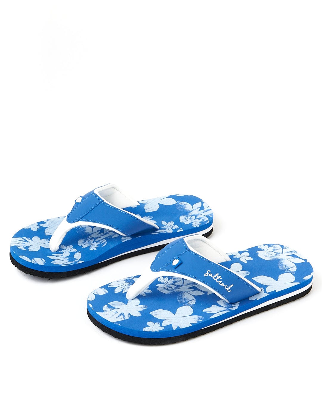 A pair of blue and white Saltrock Floral - Womens Flip Flops - Blue flip flops.