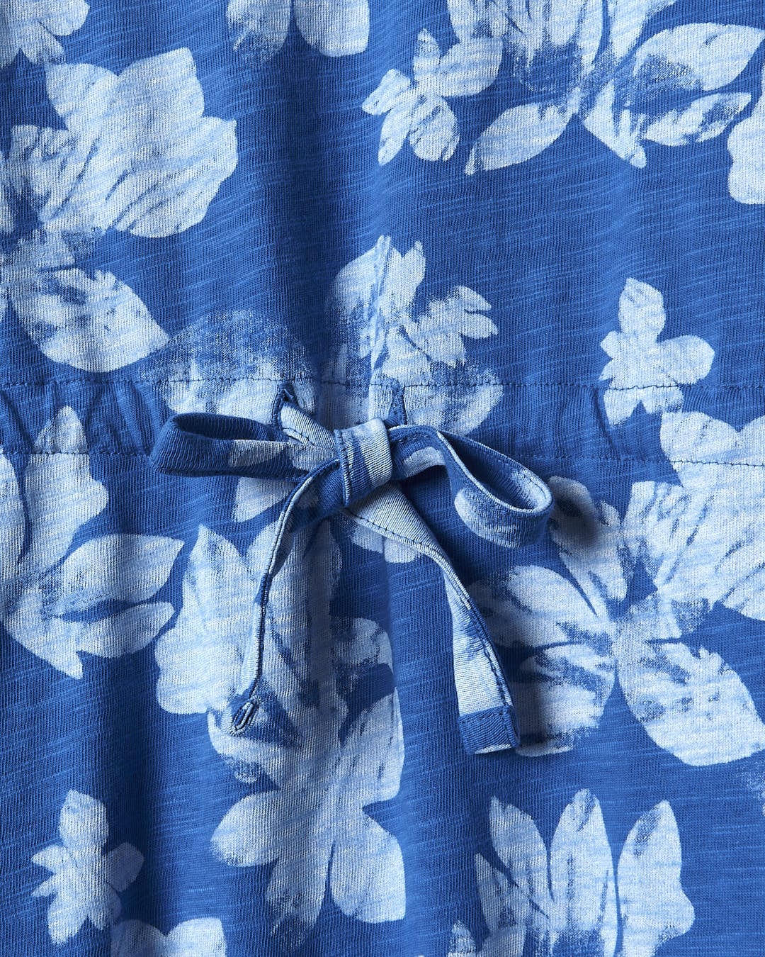 A close up of a Saltrock Floral - Womens Tie Vest Dress - Blue.