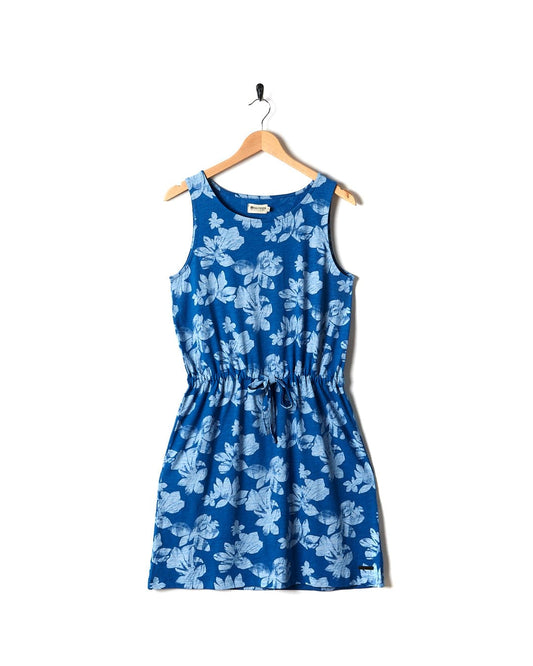 A Saltrock blue floral dress hanging on a hanger.