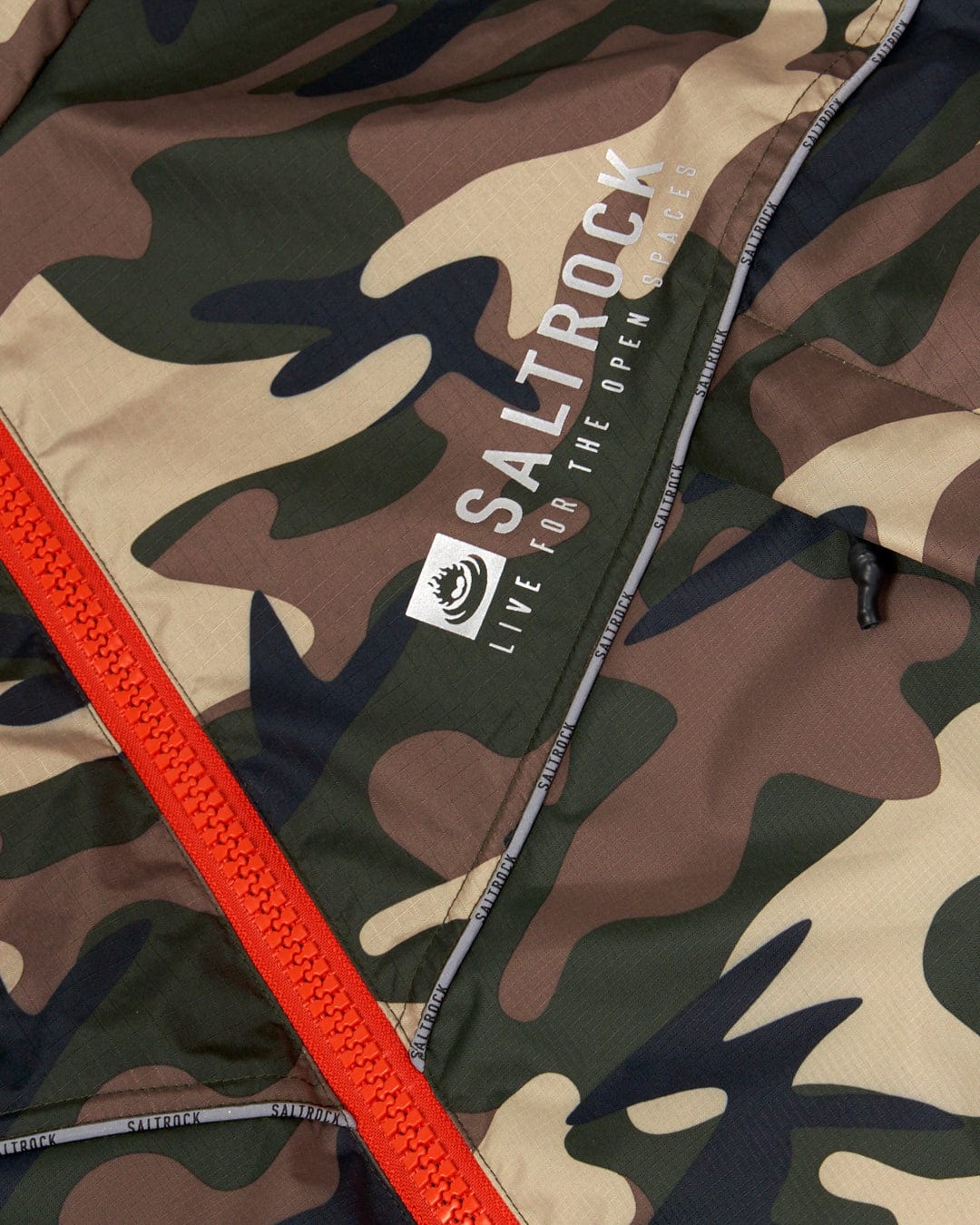 Close-up of a Recycled Four Seasons Changing Robe - Brown Camo with the Saltrock logo and an orange zipper detail.