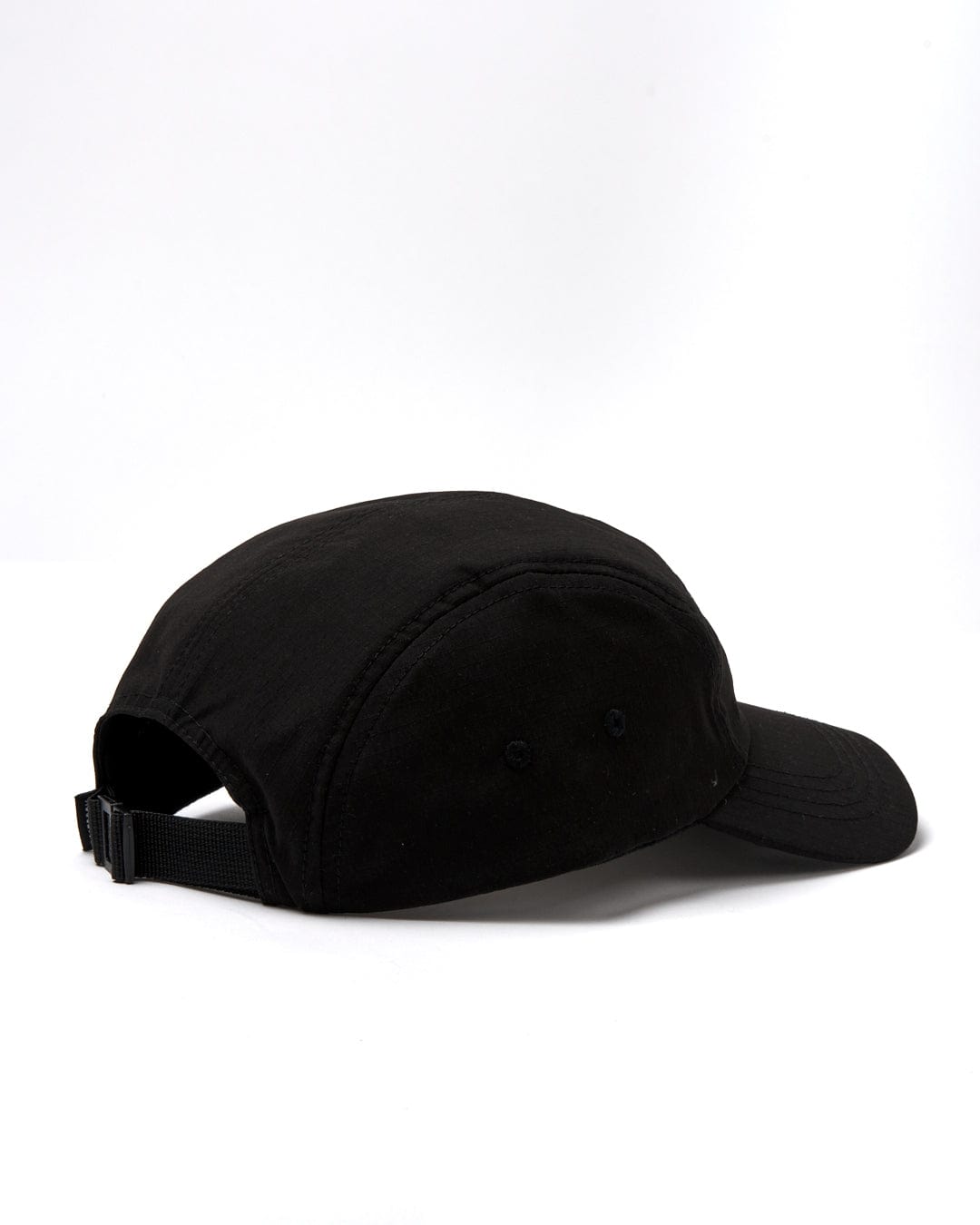 A Saltrock Gaitor 5 Panel UPF Cap in Black with an adjustable strap on a white background.