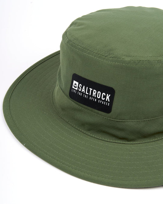A Saltrock green Gaitor bucket hat with an adjustable drawstring chin strap and logo on it.
