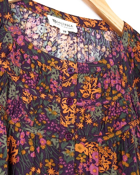 A Saltrock blouse with a Garnet - All Over Print Blouse - Orange floral print.