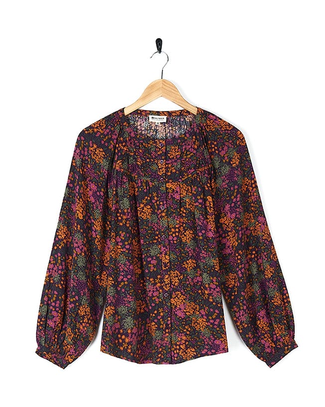 A Garnet - All Over Print Blouse - Orange with a floral print on it made by Saltrock.