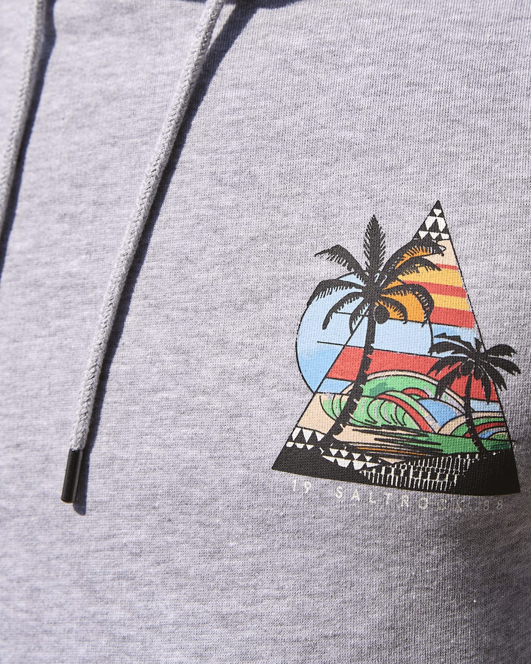 A Saltrock grey hoodie with an image of Geo Beach - Mens Pop Hoodie - Grey and palm trees.