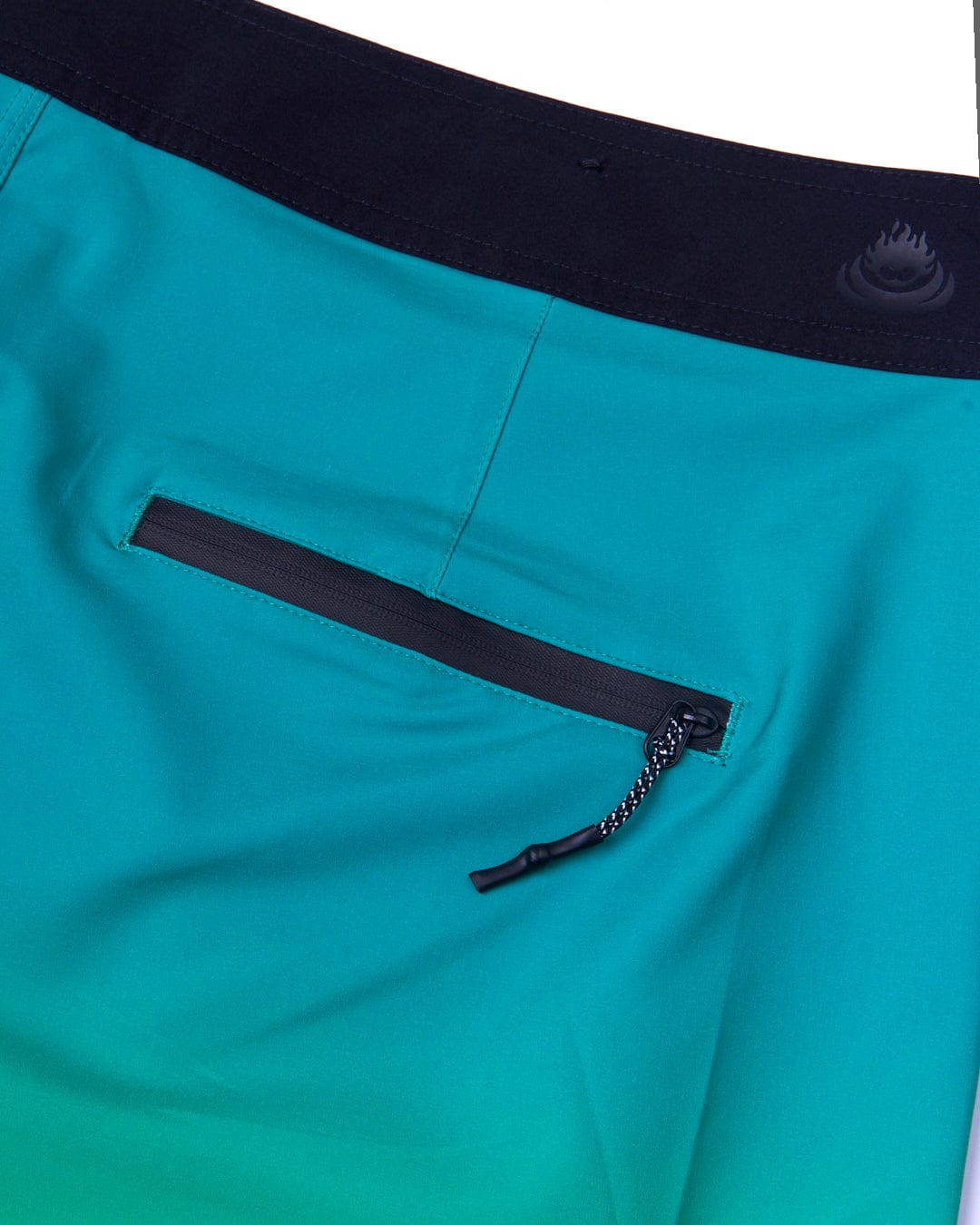 A Saltrock Geo Palms - Mens Boardshorts - Green with a zipper pocket in an ombre palm print design.