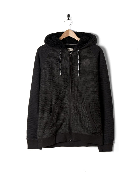 A black Hall - Borg Lined Hoodie with a hood by Saltrock.