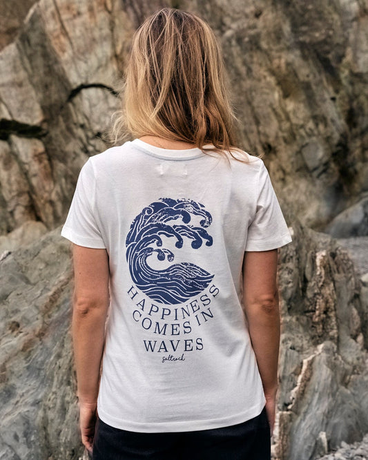 A woman wearing a white Saltrock Happiness Velator - Womens T-Shirt with a wave on it exudes happiness.